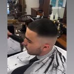 Buzz fade haircut with sharp lineup